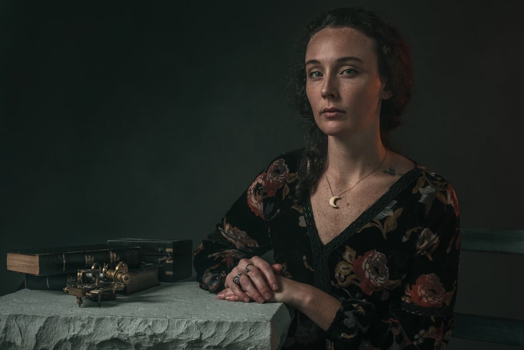 Studio portrait of a Latin American woman historian smiling